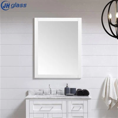 What is the best location to place an oval framed bathroom mirror in a bathroom?